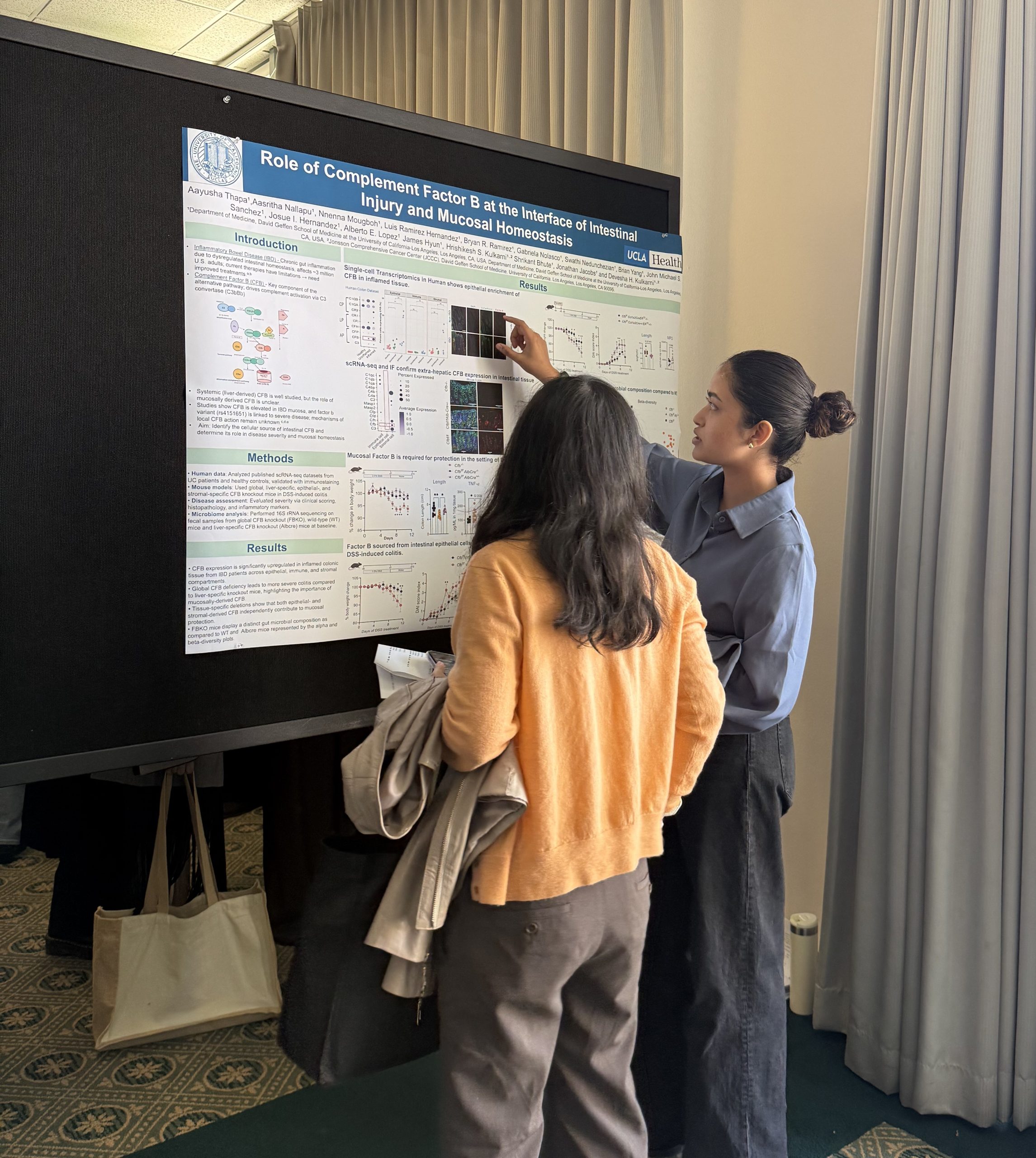 AT_GLMC_2 Aayusha Thapa, SRA in the lab, presenting her poster at GLMC symposium