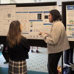 Bryan Ramirez presenting poster at GLMC symposium